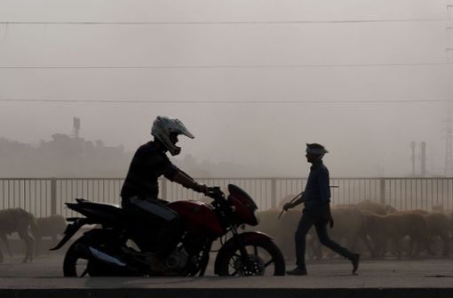 Durchatmen unmöglich: der Smog in Neu Delhi wird immer dicker. Foto: AFP