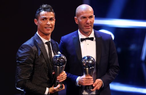 Weltfußballer Cristiano Ronaldo und Weltrainer Zinédine Zidane von Real Madrid. Foto: Getty Images Europe