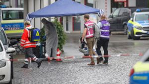 Die Spurensicherung ermittelt am Tatort in der Innenstadt. Foto: dpa/Thomas Warnack