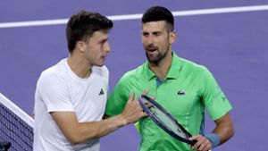 Novak Djokovic (rechts) scheiterte an Luca Nardi. Foto: AFP/MATTHEW STOCKMAN