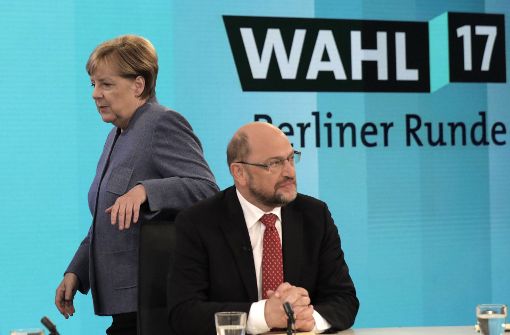 So sehen Verlierer aus: Angela Merkel und Martin Schulz am Wahlabend. Foto: AP