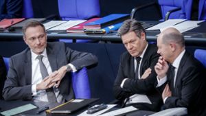 Christian Lindner, Robert Habeck und Olaf Scholz im Bundestag. Foto: Kay Nietfeld/dpa