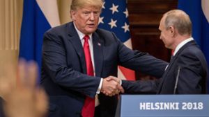 Das Treffen mit Putin (rechts) hat Trump innenpolitisch unter Druck gebracht. Foto: Getty Images Europe
