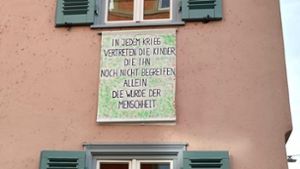 Plakat an einem Haus im Stuttgarter Bohnenviertel Foto: Sellner