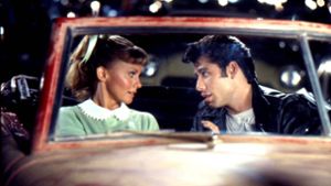 Olivia Newton-John als „Sandy“ und John Travolta als „Danny“ aus dem Film „Grease“. Foto: dpa/Paramount Pictures