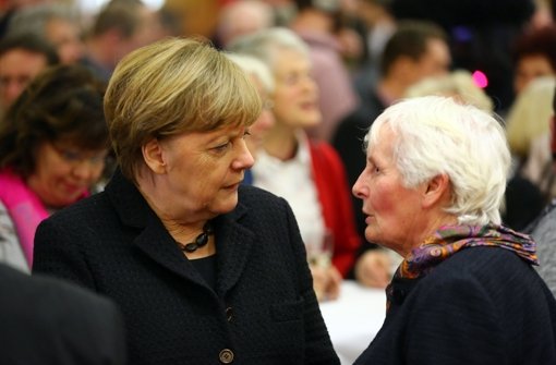 Angela Merkel muss sich in diesen Tagen und Wochen vielen besorgten Fragen stellen. Aber ihren Asylkurs will sie nicht ändern. Foto: dpa
