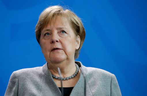 Angela Merkel sagte am Freitag in ihrem wöchentlichen Podcast, sie könne noch keine Stichtage für ein Ende der Anordnungen nennen. Foto: AFP/ODD ANDERSEN