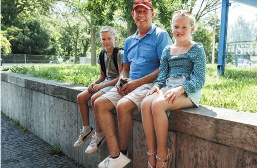 Familie Munniksma aus den Niederlanden, Vater Anton, Jelle und Iris, die 10-jährigen Zwillinge. Foto: Lichtgut/Rettig