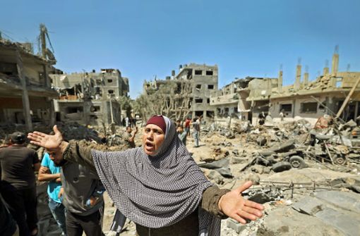 Israels Bomben treffen auch Wohnhäuser in Gaza. Die Hamas platziere ihre militärische Infrastruktur  bewusst inmitten ziviler Infrastruktur, rechtfertigt sich die israelische  Armee. Foto: AFP/Mahmud Hams