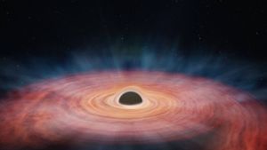 In dieser künstlerischen Darstellung verschlingt ein supermassereiches Schwarzes Loch einen Stern. Foto: Imago/Zuma Wire