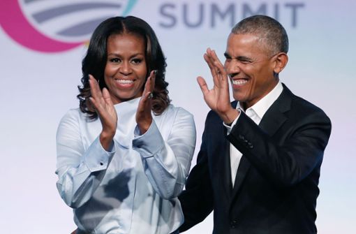 Michelle und Barack Obama steigen als Filmproduzenten bei Netflix ein. Foto: AFP