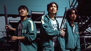 Park Hae-soo, Lee Jung-jae und Jung Hoyeon (von links) spielen in „Squid  Game“ um ihr Leben. Foto: Netflix/Youngkyu Park
