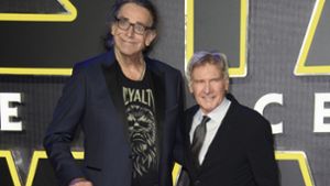 Es war kein Filmtrick aus „Star Wars“: Der Chewbacca-Darsteller Peter Mayhew (li.) war auch im Leben viel größer als Harrison Ford alias Han Solo. Foto: dpa