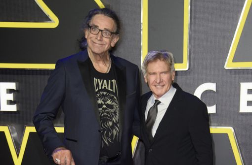 Es war kein Filmtrick aus „Star Wars“: Der Chewbacca-Darsteller Peter Mayhew (li.) war auch im Leben viel größer als Harrison Ford alias Han Solo. Foto: dpa