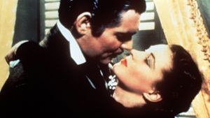 Clark Gable alias Rhett Butler und Vivien Leigh alias Scarlett O’Hara im Filmklassiker „Vom Winde verweht“  (1939). In einem zeitgenössischen Remake dieser Szene würde sich wohl niemand über den  sanft dahin gehauchten Satz „Ich bin negativ, Baby“ wundern. Foto: picture-alliance/ dpa