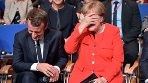 Sichtlich vergnügt haben der französische Staatspräsident Emmanuel Macron und die deutsche Bundeskanzlerin Angela Merkel die diesjährige Buchmesse in Frankfurt eröffnbet. Foto: Getty Images Europe