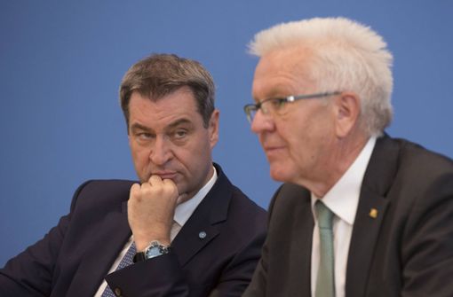 Markus Söder (links) und Winfried Kretschmann haben beim Thema Föderalismus unterschiedliche Ansichten. Foto: imago images/Jens Jeske