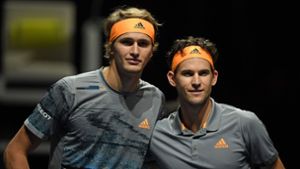 Gleicher Sponsor, unterschiedliches Tennisspiel: Alexander Zverev (links) und sein Kumpel Dominic Thiem. Foto: AFP/Daniel Leal-Olivas