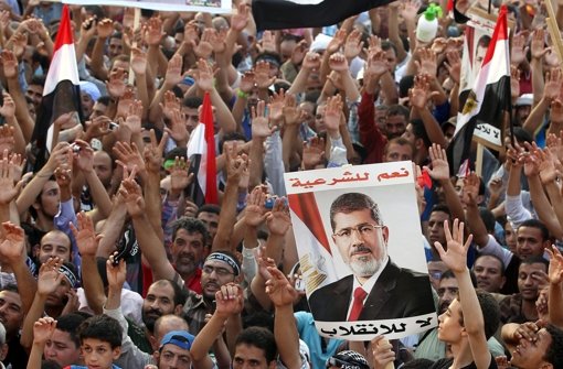 Anhänger des früheren Präsidenten Mohammed Mursi demonstrieren in Kairo. Foto: dpa