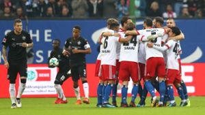 Die Spieler des HSV feiern ihren Führungstreffer gegen den VfB Stuttgart. Foto: Bongarts
