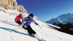Das Skigebiet Carezza in den Dolomiten lockt schon an den kurzen Dezembertagen dank seiner Südhänge mit vielen Sonnenstunden. Foto: TVB ROSENGARTEN/LATEMAR