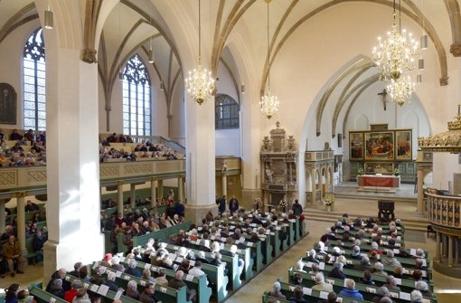 Volle Kirchenbänke wie hier in Wittenberg sind selten geworden. Foto: dpa-Zentralbild