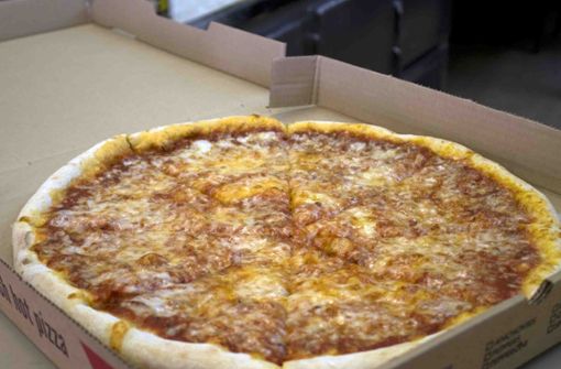 Mit den bestellten Pizzen flüchteten die Unbekannten. (Symbolfoto) Foto: AP/J.M. Hirsch