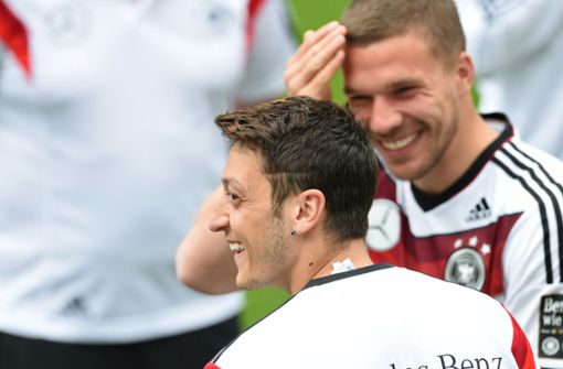 Waren gemeinsam erfolgreich: Mesut Özil und Lukas Podolski. Foto: dpa/Andreas Gebert