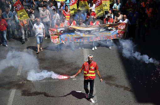 „Der Kampf geht weiter“ steht auf dem Banner der Demonstranten. Foto: AFP