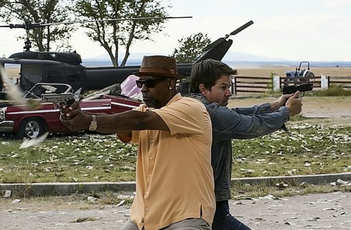 Jeder versucht, den anderen auszutricksen: Denzel Washington (li.) und Mark Wahlberg in 2 Guns. Foto: Verleih
