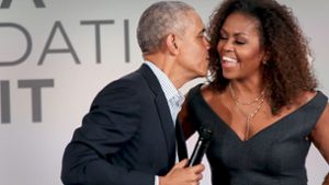 Michelle und Barack Obama: eingespieltes Team, jetzt auch in der  Podcast-Version Foto: AFP/  Olson