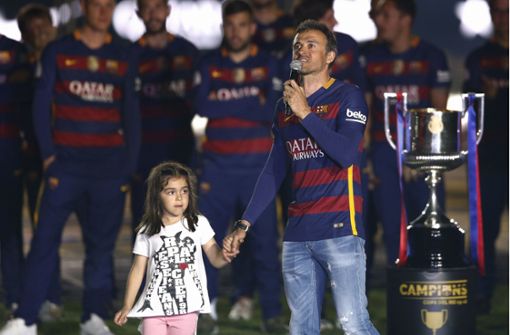 Luis Enrique und seine Tochter nach dem Champions-League-Gewinn 2016 mit dem FC Barcelona. Foto: AP