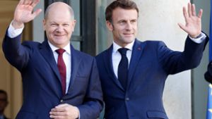 Spröder Kanzler, flamboyanter Président: Scholz (li.) und Macron tun sich schwer miteinander. Foto: AFP