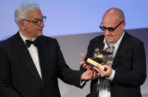 Die Dokumentation „Sacro GRA“ des italienischen Regisseurs Gianfranco Rosi (rechts) hat den Goldenen Löwen der 70. Internationalen Filmfestspiele Venedig gewonnen. Foto: dpa