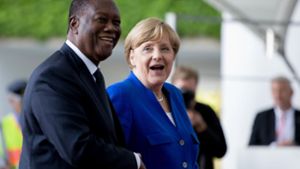 Die Elfenbeinküste unter Präsident  Alassane Ouattara gehört zu den wenigen Ländern, die sich auf eine von Kanzlerin Angela Merkel vorangetriebenen Reformpartnerschaften mit Deutschland eingelassen hat. Foto: dpa