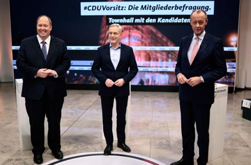 Helge Braun, Norbert Röttgen und Friedrich Merz (von links) kandidieren für den Vorsitz der CDU. Konkret wird aber keiner von ihnen. Foto: AFP/HANNIBAL HANSCHKE