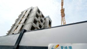 Die Aktienpapiere des chinesischen Bauträgers Country Garden werden vorläufig nicht mehr an der Börse in Hongkong gehandelt. Foto: Ng Han Guan/AP/dpa
