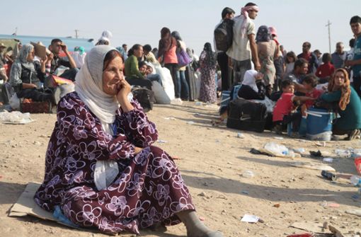 Syrische Flüchtlinge in  Dahuk im Irak im August 2013. Foto: dpa/Kamal Akrayi