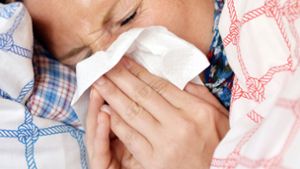Weniger Menschen erkranken an Grippe oder dem Norovirus. Foto: dpa/Maurizio Gambarini