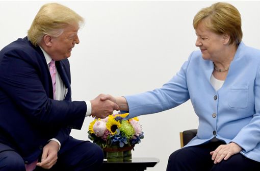 US-Präsident Donald Trump beschreibt Bundeskanzlerin Angela Merkel als „fantastische Person“. Foto: dpa