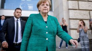 Bundeskanzlerin Angela Merkel verlässt den Reichstag Foto: dpa