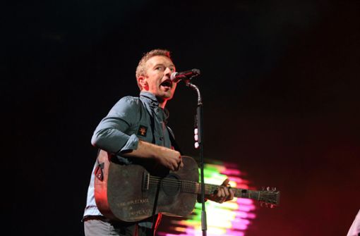 Chris Martin, Frontmann der britischen Rockband Coldplay,  spielt beim Festival Rock am Ring. Foto: dpa/Thomas Frey