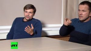 Ruslan Boschirow (links) und Alexander Petrow stellen sich den Fragen der Moderatorin. Foto: RT
