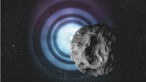 Illustration eines Asteroiden vor einem Stern. Foto: DESY, Lucid Berlin/dpa