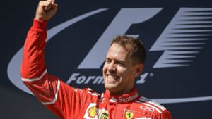 Beim Grand Prix von Ungarn am 30.7.2017 jubelte Sebastian Vettel vom Team Scuderia Ferrari auf dem Siegerpodest. Foto: AP