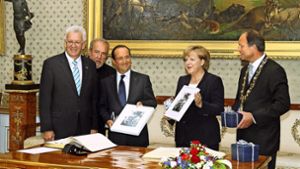 Im Jahr 2012 mit Merkel, Kretschmann und Hollande zur Feier der De-Gaulle-Rede Foto:  