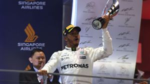 Mercedes_pilot Lewis Hamilton ist der große Sieger des Großen Preises von Singapur. Foto: AFP