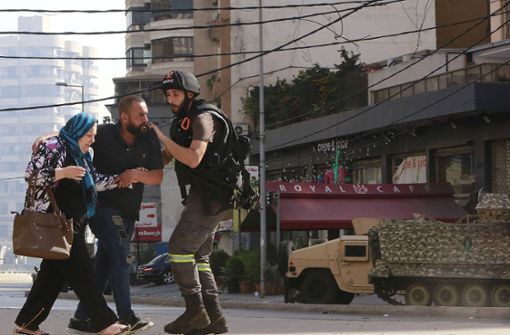 Zivilisten versuchen sich in Sicherheit zu bringen. Foto: imago/ZUMA Wire