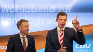 CDU-Landesgeneralsekretär Raymond Walk (links, mit Spitzenkandidat Mike Mohring) schließt eine Zusammenarbeit mit den Flügeln aus. Foto: AFP/MICHAEL REICHEL