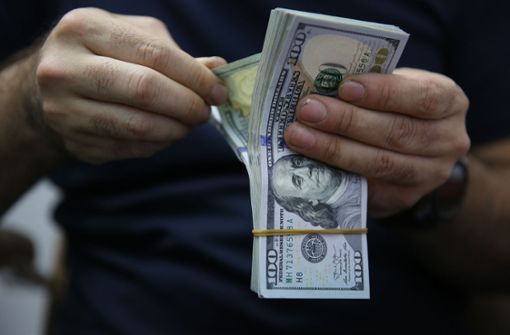 135.000 US-Dollar  in bar hat ein 19-jähriger US-Amerikaner Anfang Mai gefunden. Foto: AFP/Ajmad Al-Rubaye